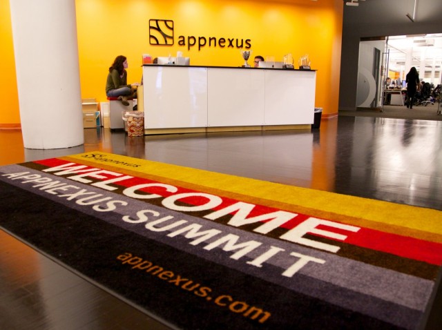 the-entrance-is-striking-decorated-with-the-signature-appnexus-orange-and-black-colors